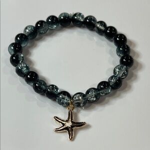 Elegant Black and Silver Beaded Bracelet with Starfish Charm